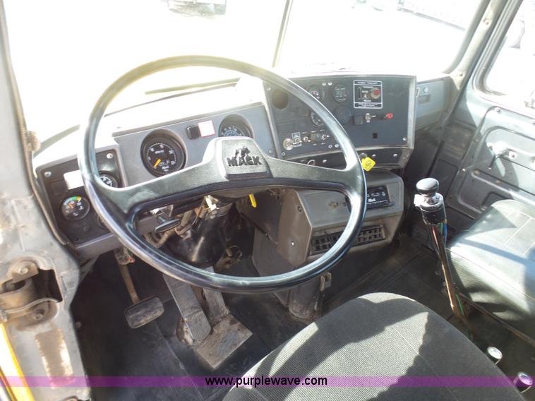 image for item L3209 1988 Mack DM690S roll off truck