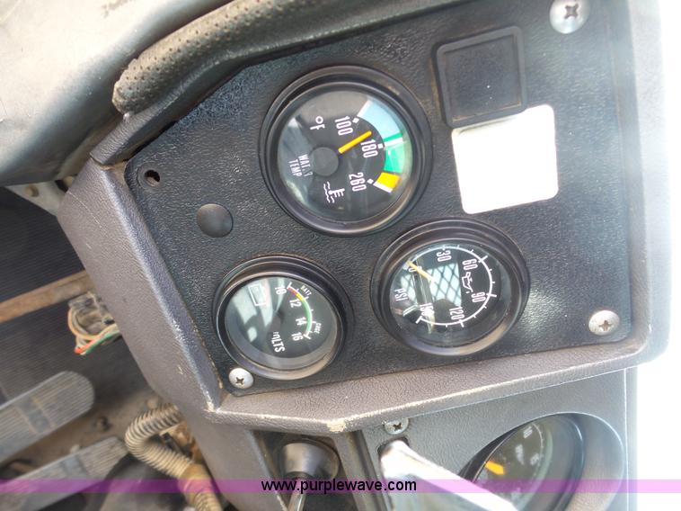 image for item L3209 1988 Mack DM690S roll off truck