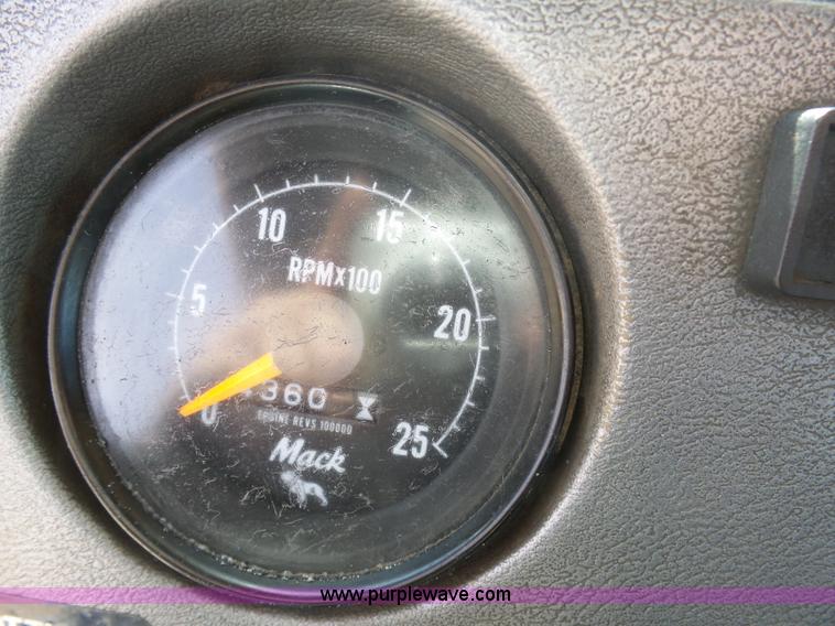 image for item L3209 1988 Mack DM690S roll off truck