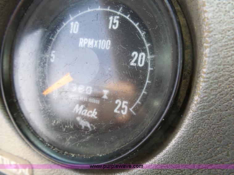 image for item L3209 1988 Mack DM690S roll off truck