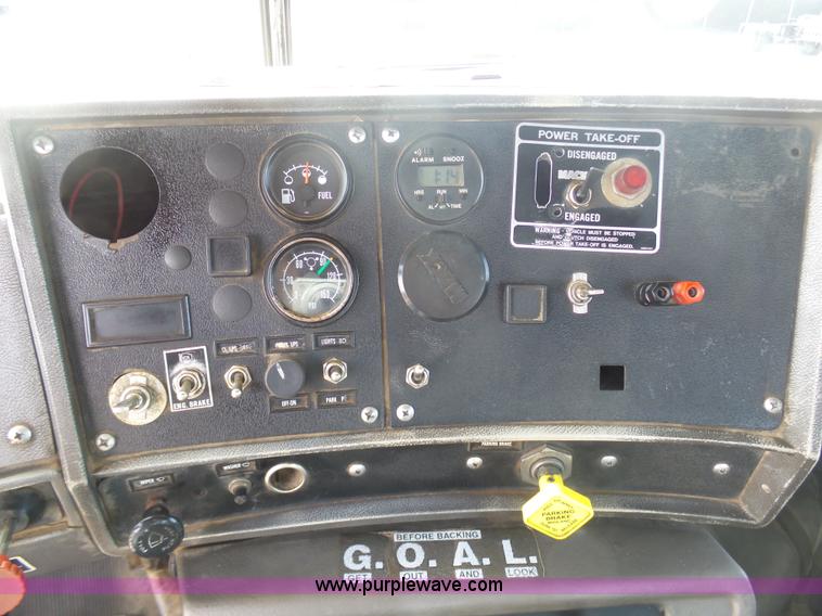 image for item L3209 1988 Mack DM690S roll off truck