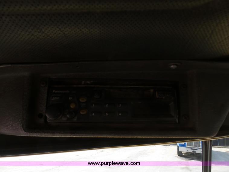 image for item L3209 1988 Mack DM690S roll off truck