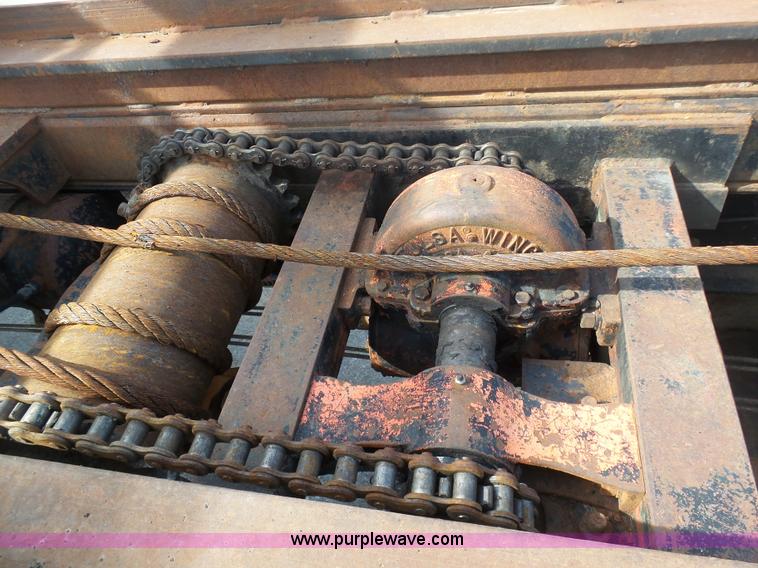 image for item L3209 1988 Mack DM690S roll off truck