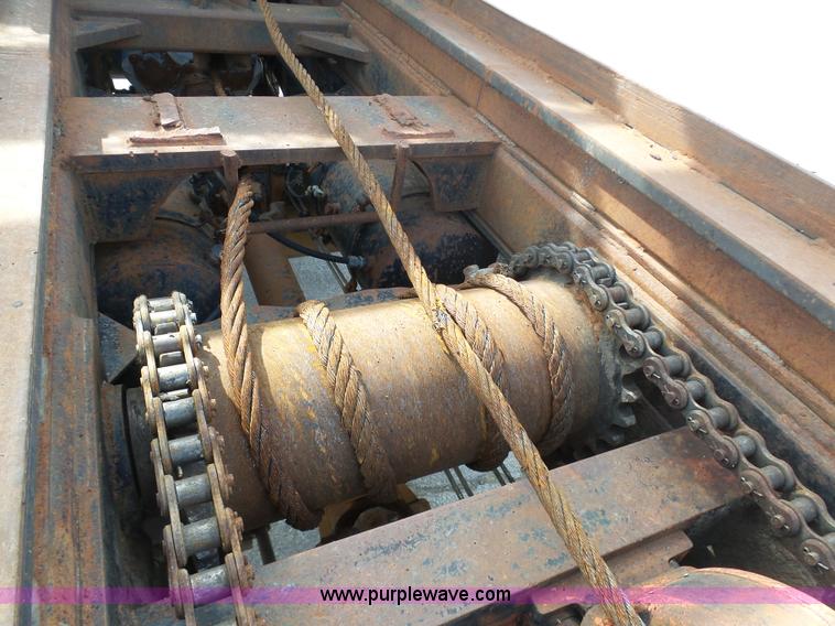 image for item L3209 1988 Mack DM690S roll off truck