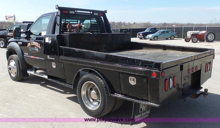 image for item L3211 2006 Ford F550 Super Duty flatbed pickup truck