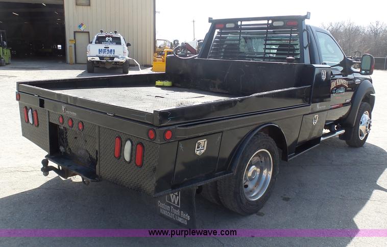 image for item L3211 2006 Ford F550 Super Duty flatbed pickup truck