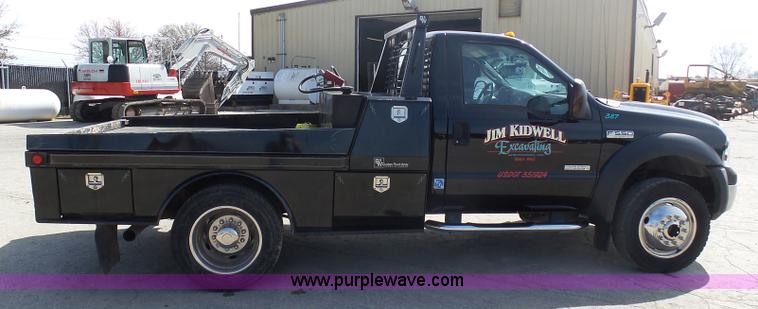 image for item L3211 2006 Ford F550 Super Duty flatbed pickup truck