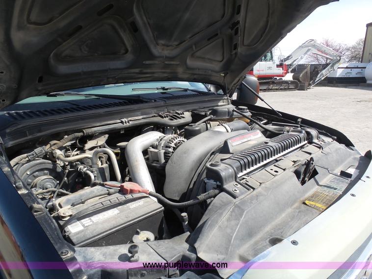 image for item L3211 2006 Ford F550 Super Duty flatbed pickup truck