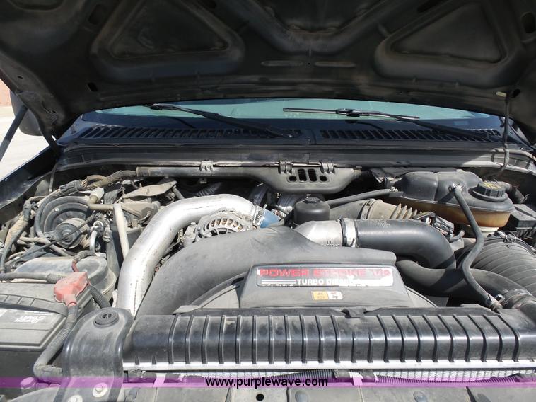 image for item L3211 2006 Ford F550 Super Duty flatbed pickup truck