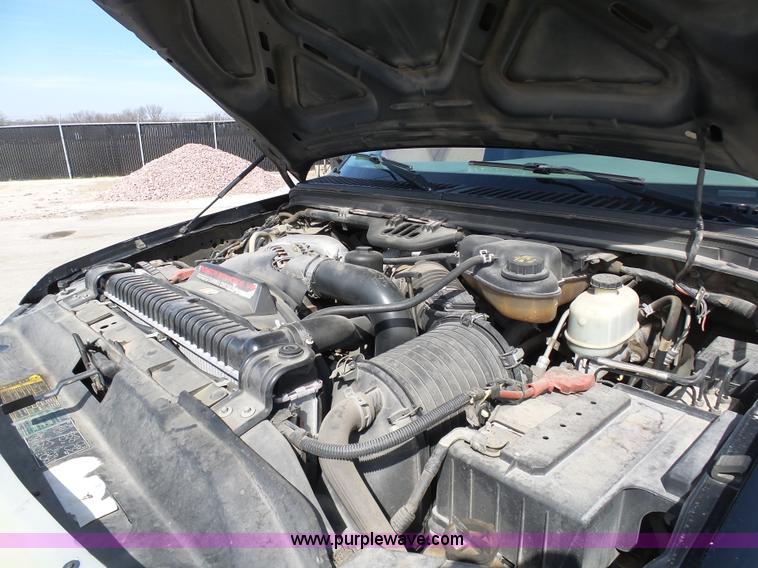 image for item L3211 2006 Ford F550 Super Duty flatbed pickup truck