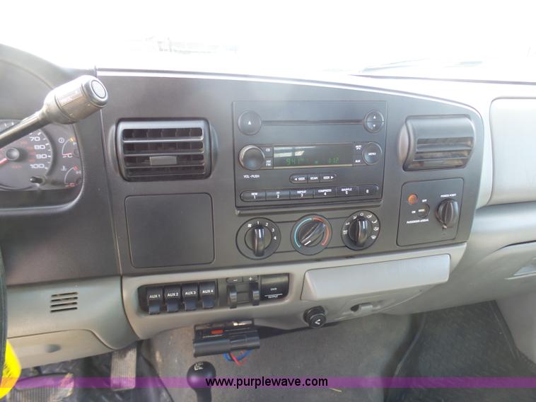 image for item L3211 2006 Ford F550 Super Duty flatbed pickup truck