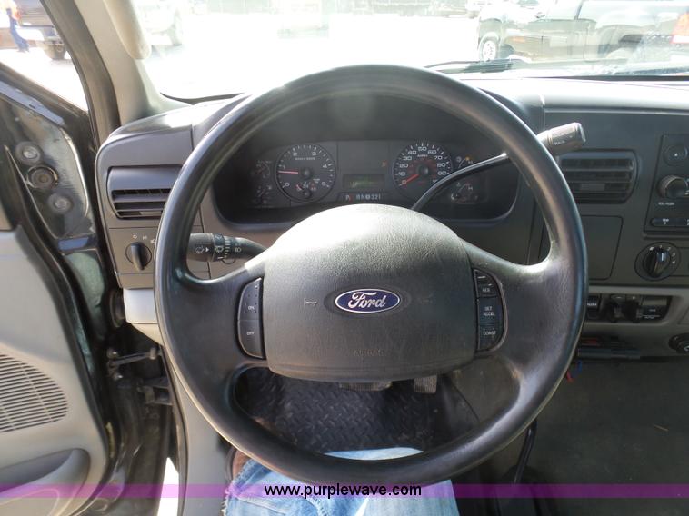 image for item L3211 2006 Ford F550 Super Duty flatbed pickup truck