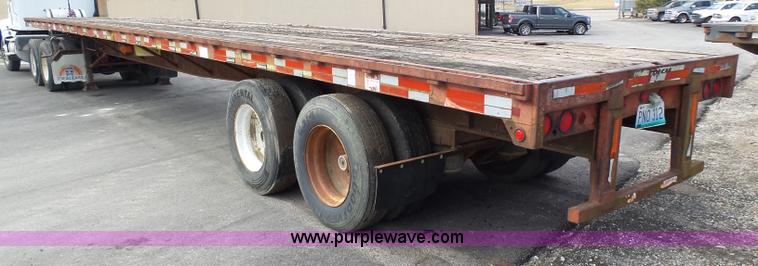 image for item K1288 1988 Fontaine HFTW310048SLA flatbed trailer