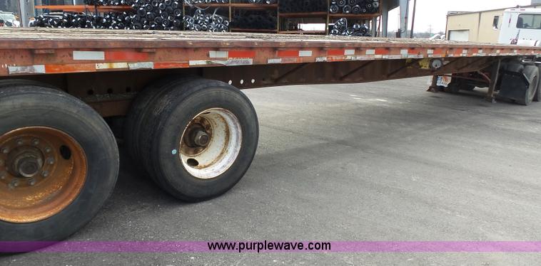 image for item K1288 1988 Fontaine HFTW310048SLA flatbed trailer