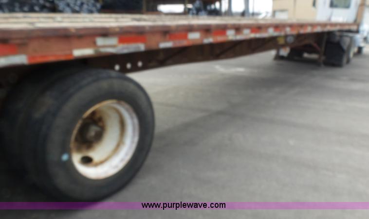 image for item K1288 1988 Fontaine HFTW310048SLA flatbed trailer