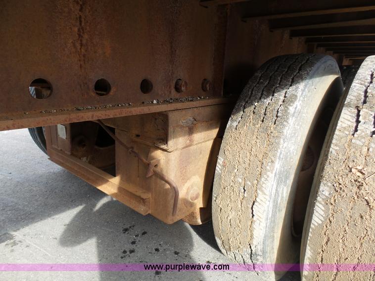image for item K1288 1988 Fontaine HFTW310048SLA flatbed trailer