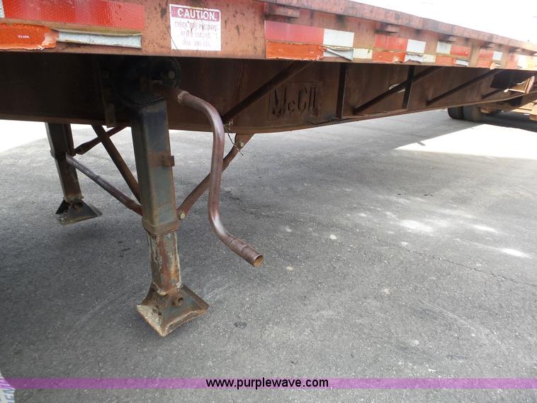 image for item K1288 1988 Fontaine HFTW310048SLA flatbed trailer