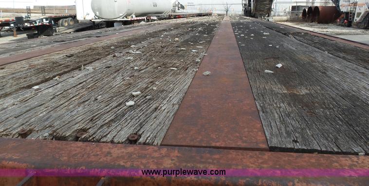 image for item K1288 1988 Fontaine HFTW310048SLA flatbed trailer