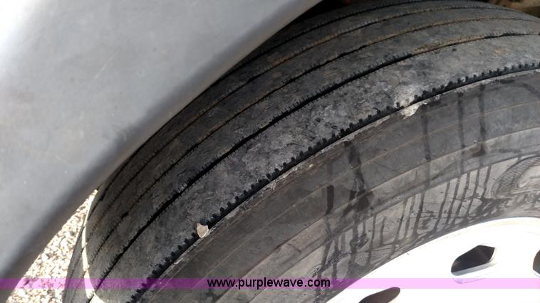 image for item L7472 1999 Freightliner FLB High semi truck