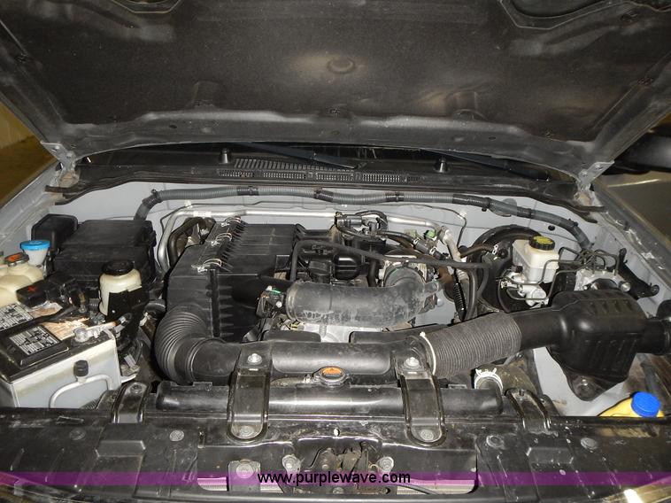 image for item J6358 2011 Nissan Frontier King Cab pickup truck