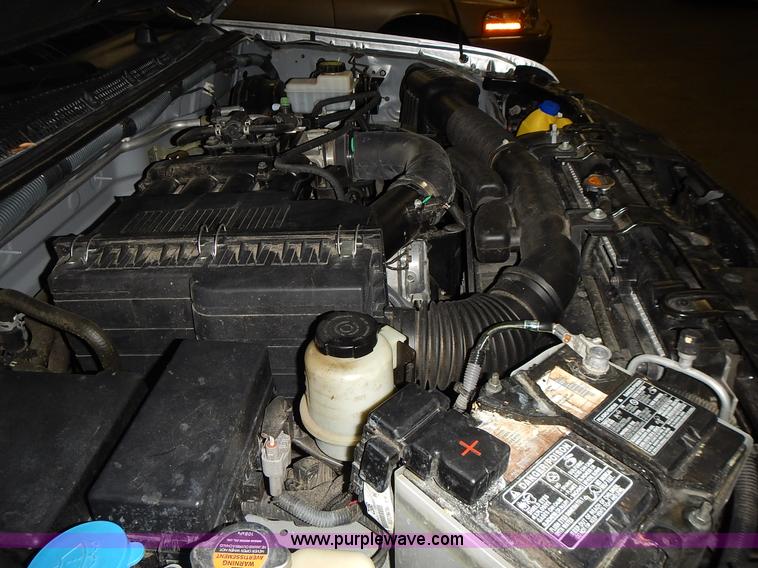 image for item J6358 2011 Nissan Frontier King Cab pickup truck