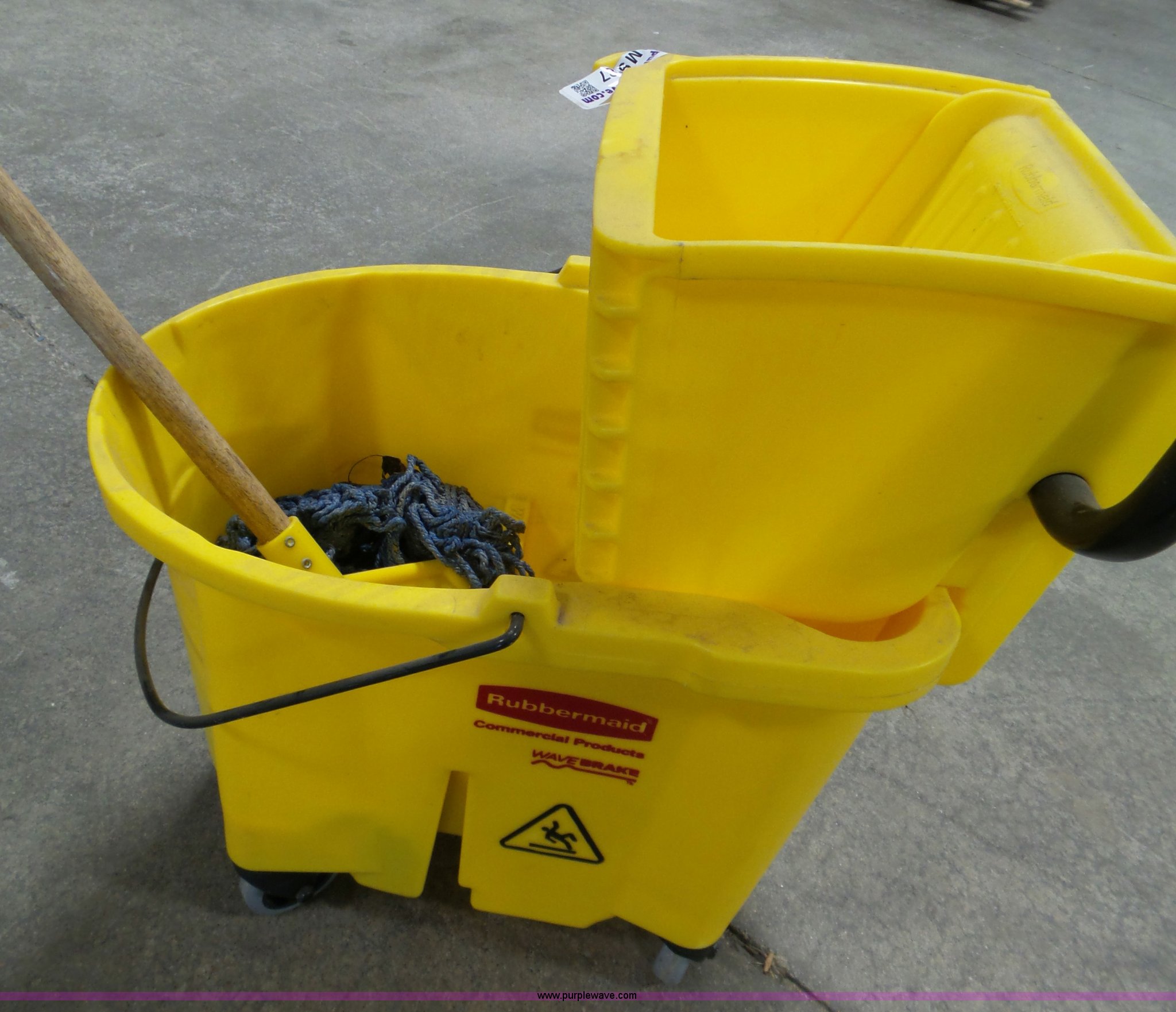 Mop bucket and mop in Manhattan, KS Item AM9687 sold Purple Wave