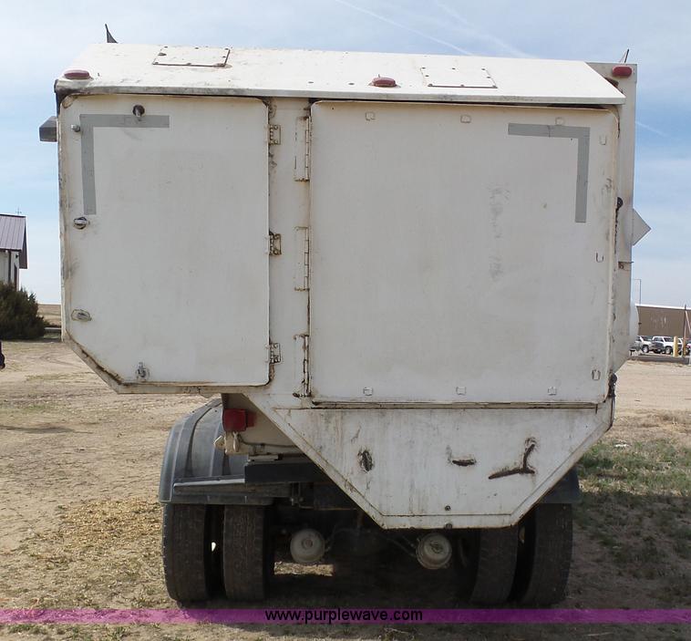 image for item AR9393 1993 Volvo WX64 feed truck