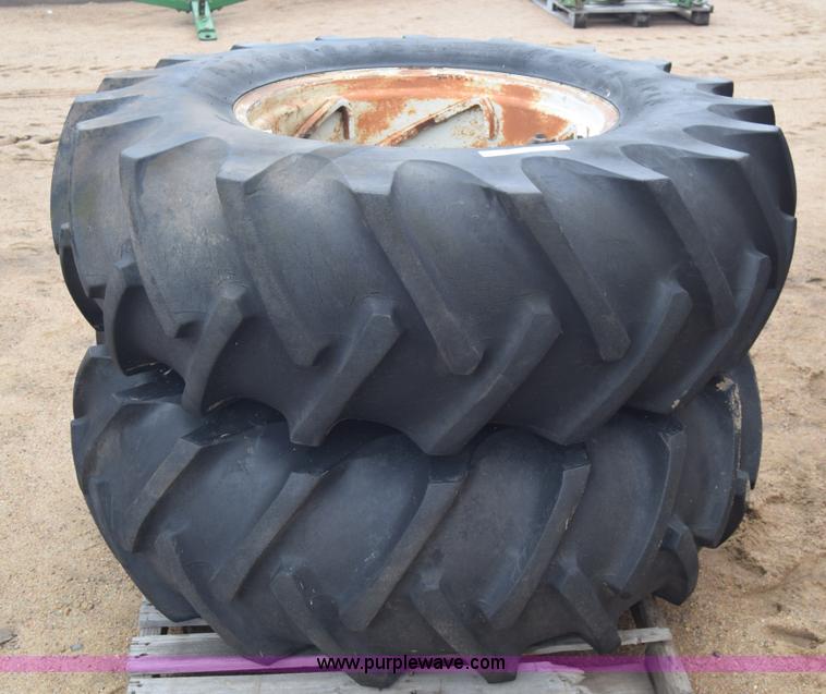 image for item AW9891 (2) 18.4-28 tractor tires and wheels
