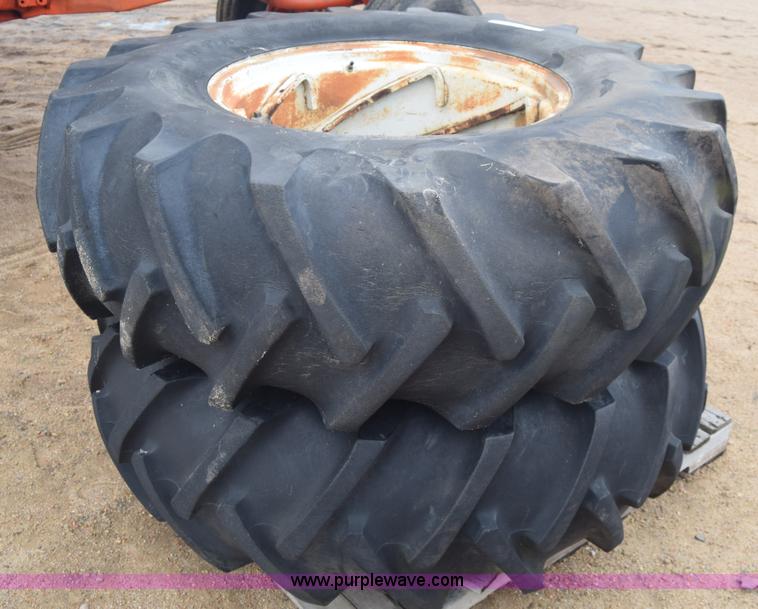 image for item AW9891 (2) 18.4-28 tractor tires and wheels