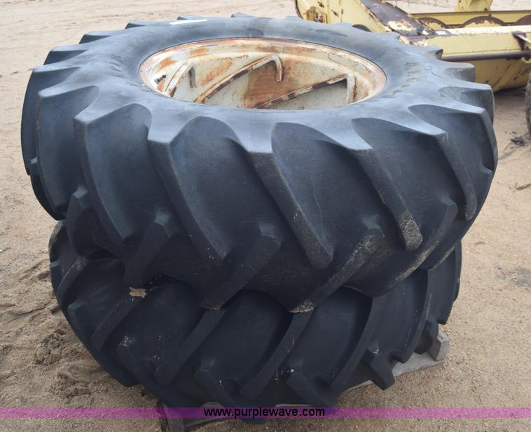 image for item AW9891 (2) 18.4-28 tractor tires and wheels