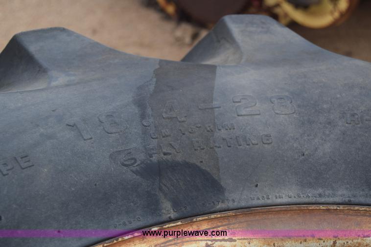 image for item AW9891 (2) 18.4-28 tractor tires and wheels
