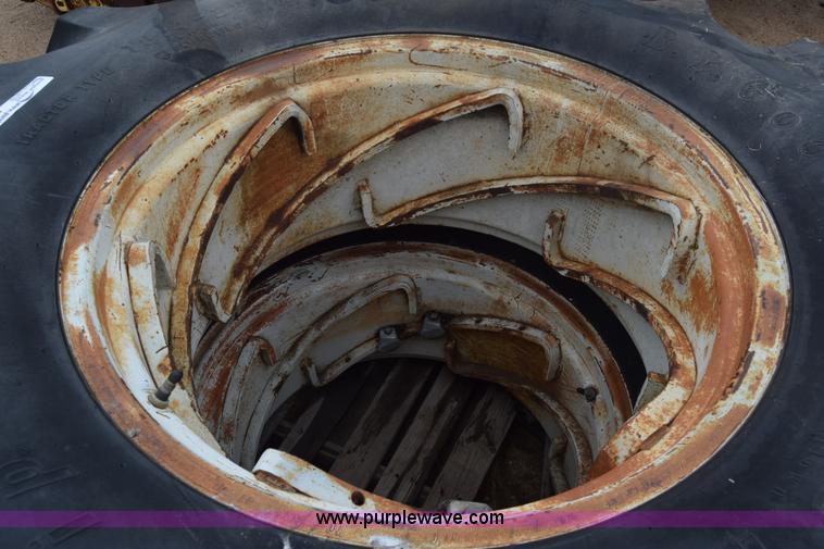 image for item AW9891 (2) 18.4-28 tractor tires and wheels