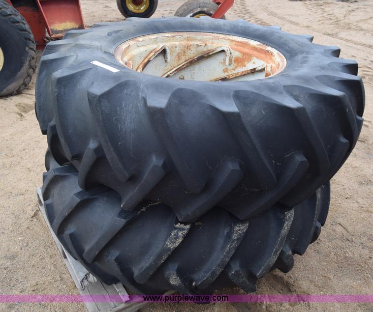 image for item AW9891 (2) 18.4-28 tractor tires and wheels