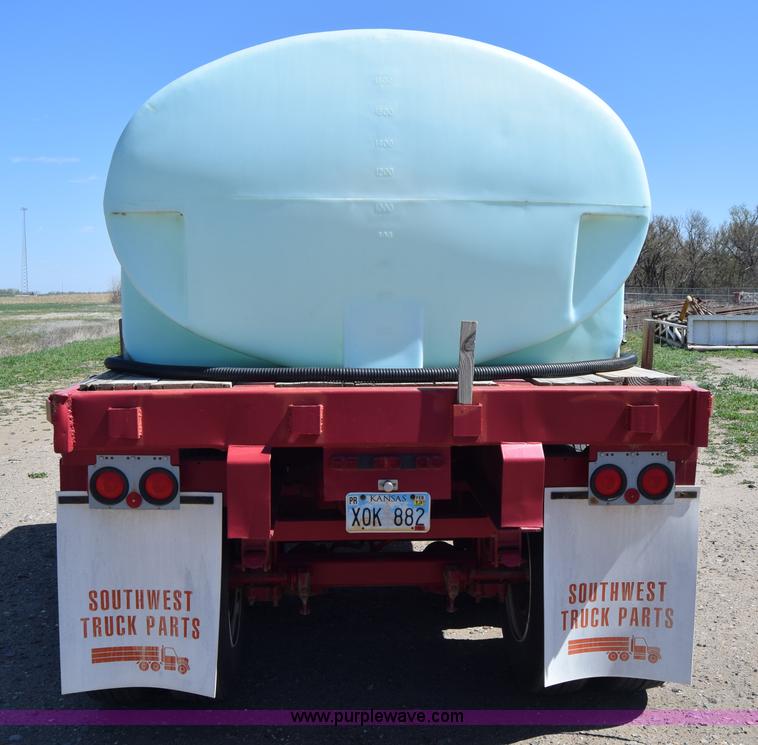 image for item BX9963 1980 Hobb flatbed trailer with poly tanks