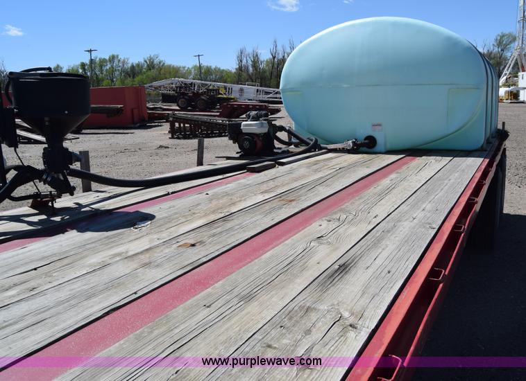 image for item BX9963 1980 Hobb flatbed trailer with poly tanks