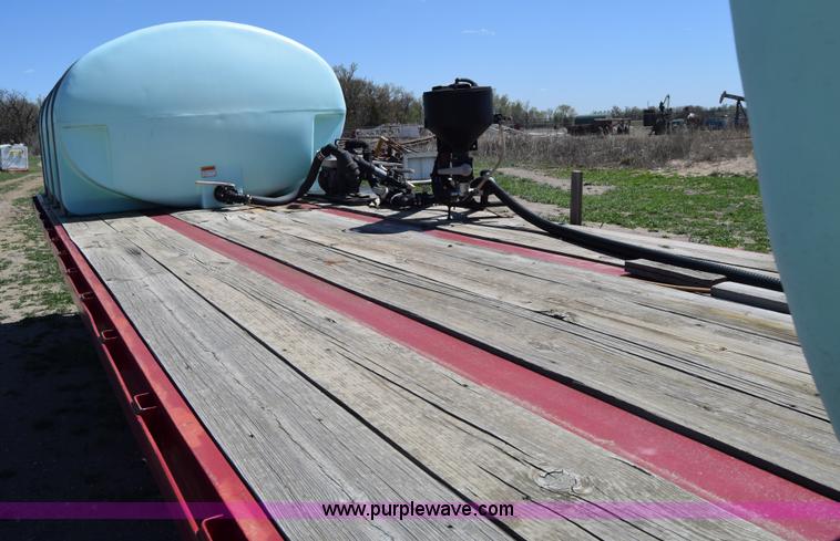 image for item BX9963 1980 Hobb flatbed trailer with poly tanks