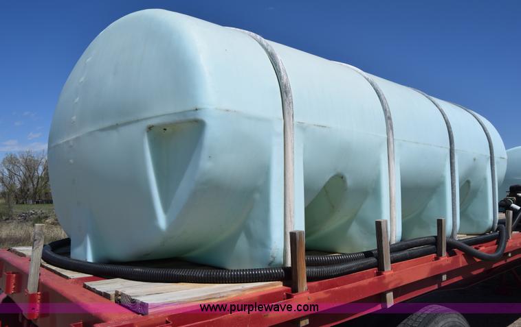 image for item BX9963 1980 Hobb flatbed trailer with poly tanks