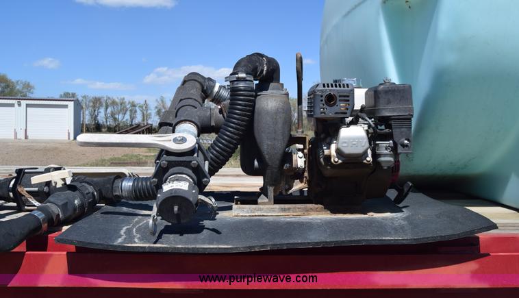 image for item BX9963 1980 Hobb flatbed trailer with poly tanks