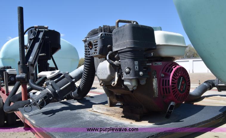 image for item BX9963 1980 Hobb flatbed trailer with poly tanks