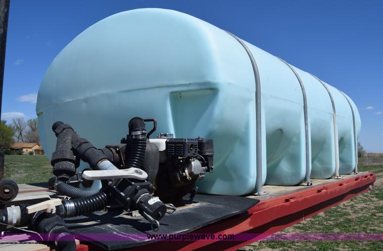 image for item BX9963 1980 Hobb flatbed trailer with poly tanks