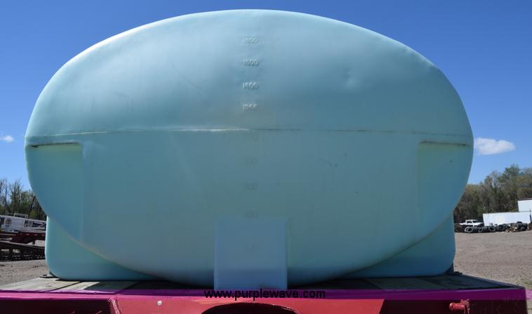 image for item BX9963 1980 Hobb flatbed trailer with poly tanks