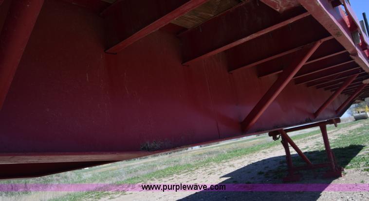 image for item BX9963 1980 Hobb flatbed trailer with poly tanks