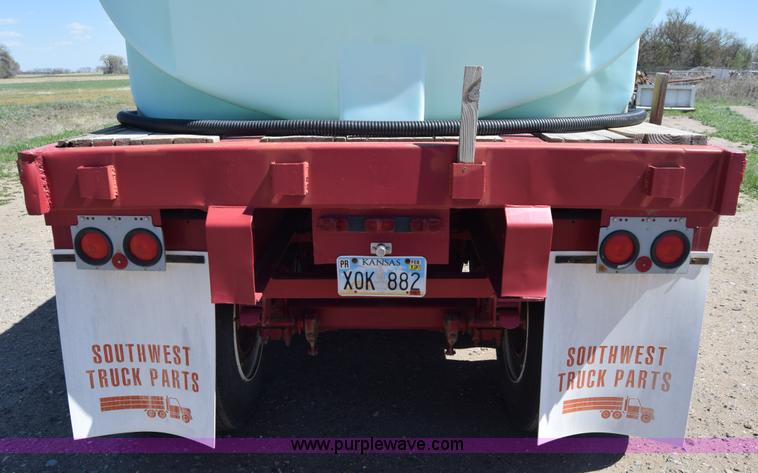 image for item BX9963 1980 Hobb flatbed trailer with poly tanks