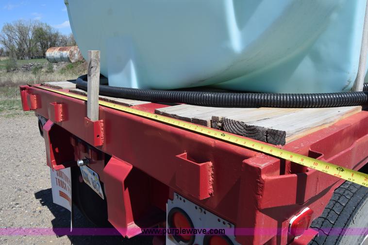 image for item BX9963 1980 Hobb flatbed trailer with poly tanks