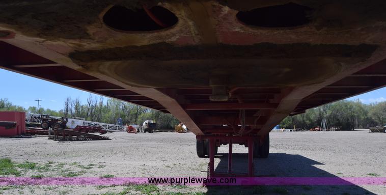 image for item BX9963 1980 Hobb flatbed trailer with poly tanks