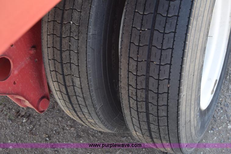 image for item BX9963 1980 Hobb flatbed trailer with poly tanks