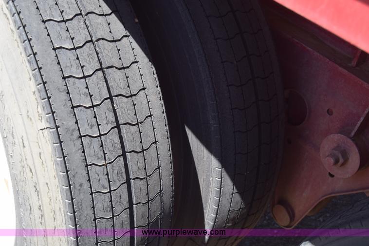 image for item BX9963 1980 Hobb flatbed trailer with poly tanks