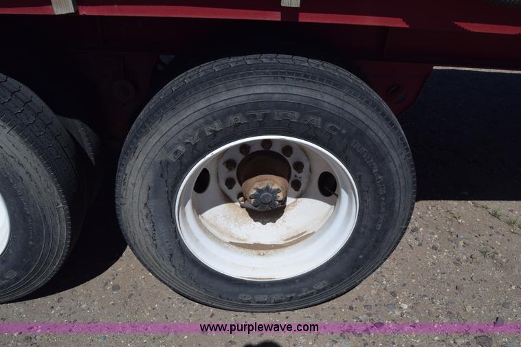 image for item BX9963 1980 Hobb flatbed trailer with poly tanks