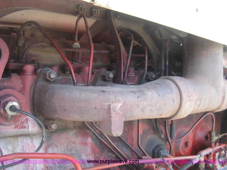 image for item J2835 International Farmall 806 tractor