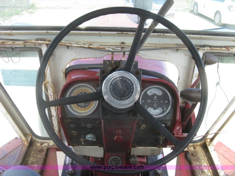 image for item J2835 International Farmall 806 tractor